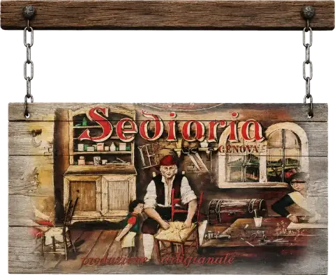 Sediaria Genova — l'insegna storica del negozio, appesa alle catene, con la scena della produzione artigianale di sedie